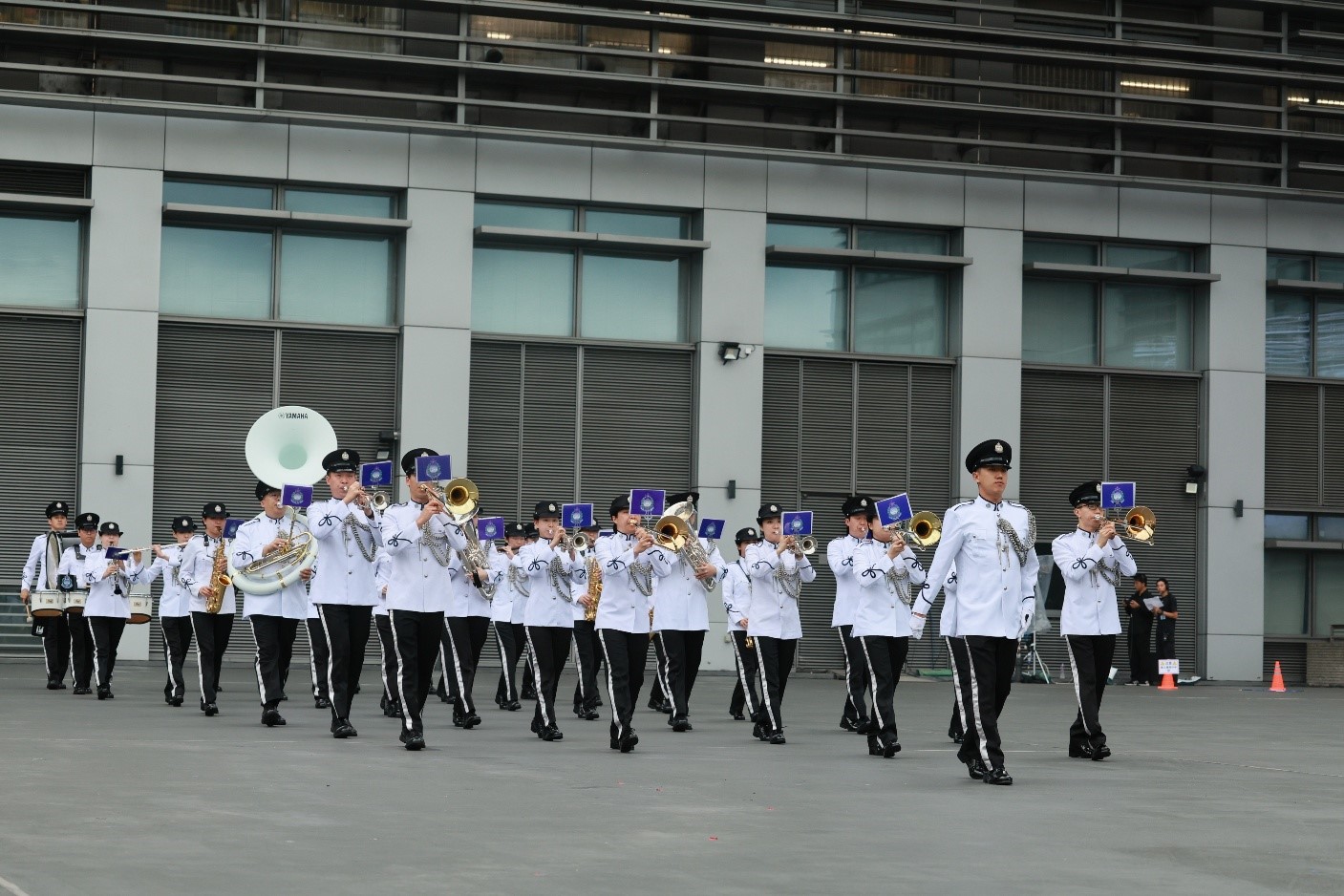 Photo shows the Immigration Band giving a performance during the open day