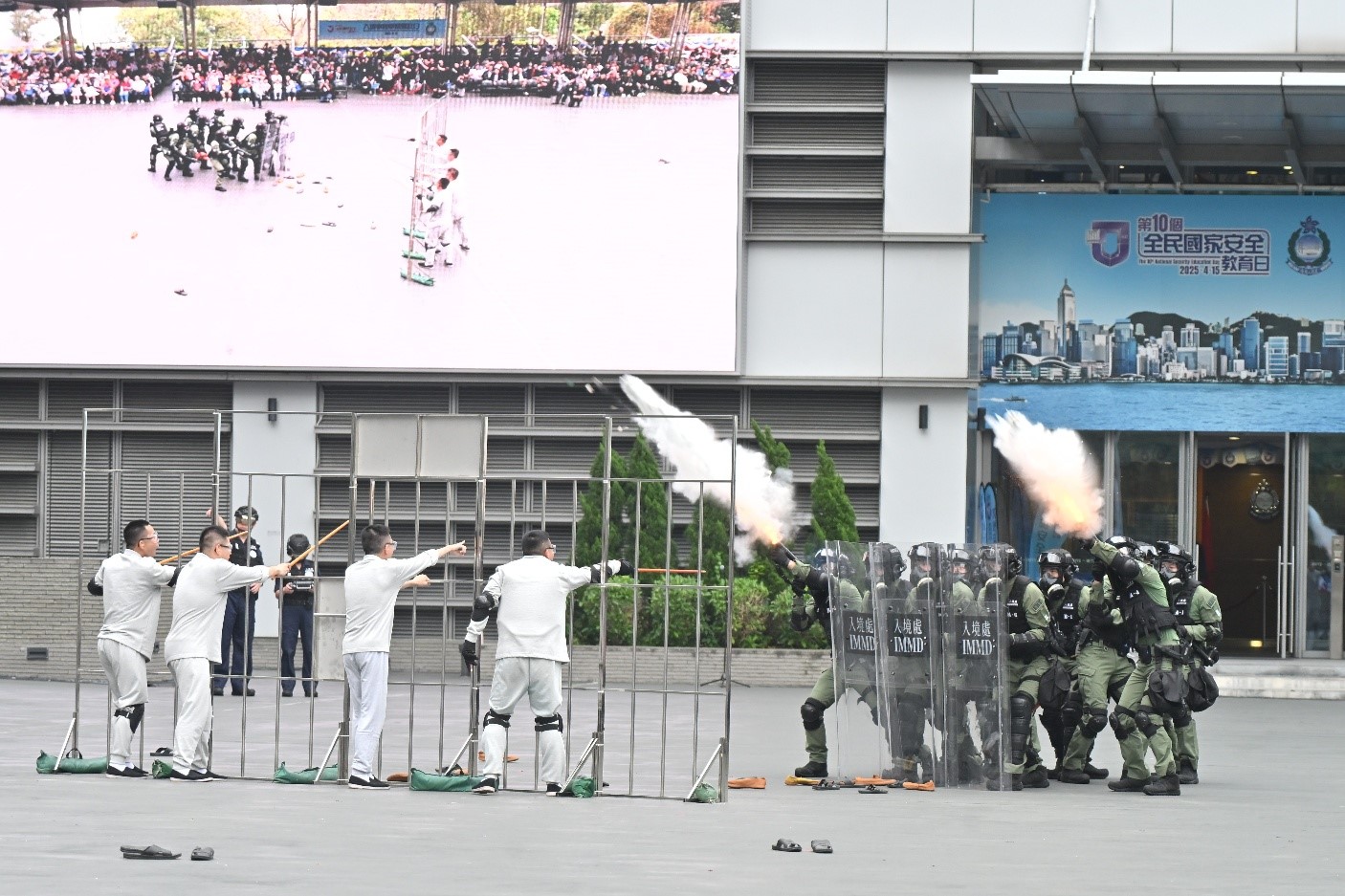 Photo shows the Emergency Response Team of the Castle Peak Bay Immigration Centre conducting a firearm and tactical demonstration