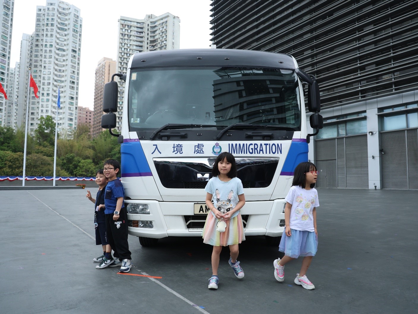 Photo shows the demonstration by the vehicle of the Immigration Department at the open day